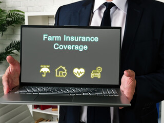 Laptop showing “Farm Insurance coverage” on the screen