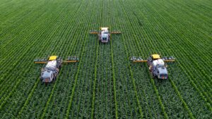 Three harvesters in the field top view